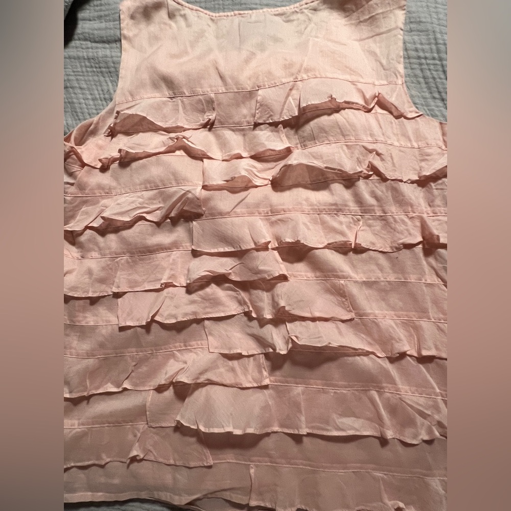 Pink cotton ruffled tank top.
